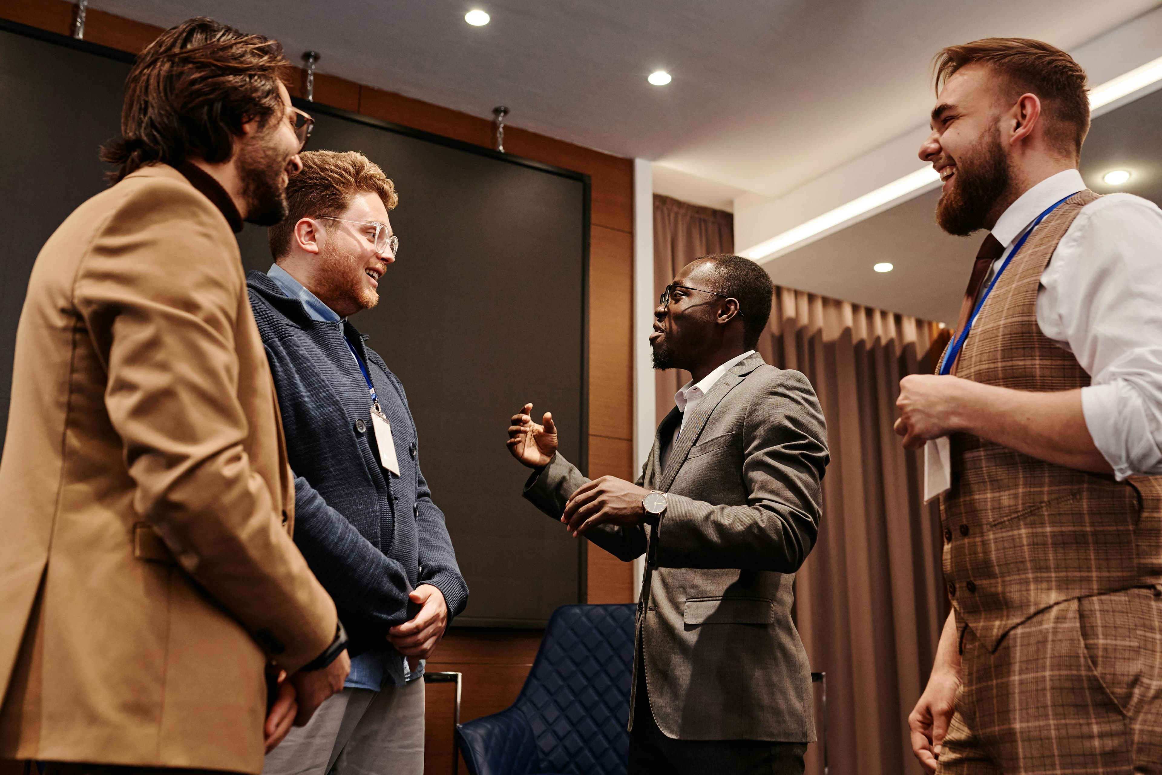 Investigators networking between conference sessions